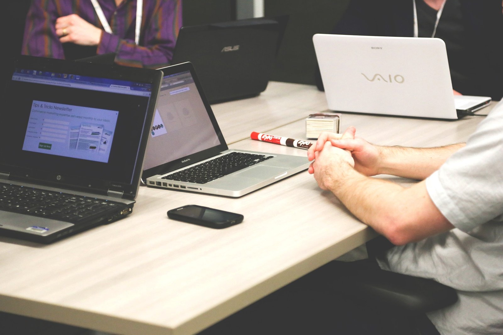 People collaborating by laptop during a video conference